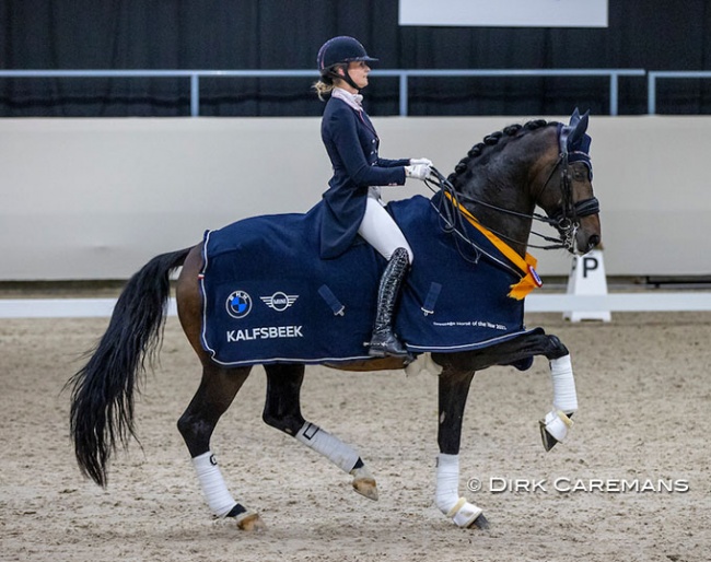 Dinja van Liere and Hermes decorated with the 2021 KWPN Horse of the Year sash :: Photo © Dirk Caremans