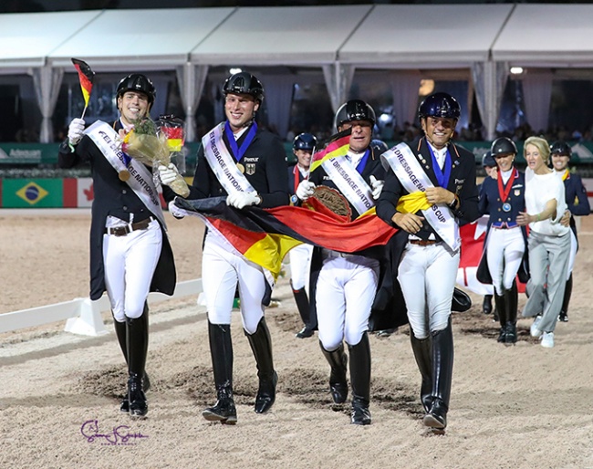 Team Germany (Wandres, Ligus, Klimke, Koschel) in their lap of honour after winning the FEI Nations Cup at the 2022 CDIO Wellington :: Photo © Sue Stickle