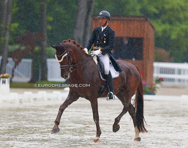 Gilles Ngovan competing Zig Zag in the rain at the 2022 CDIO Compiegne :: Photo © Astrid Appels
