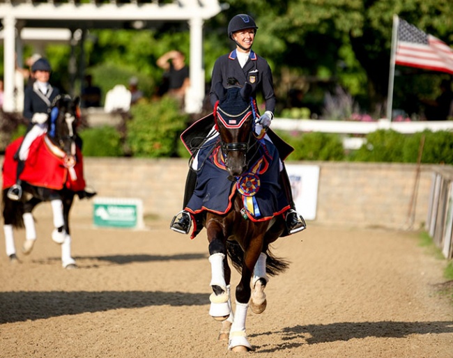 Laura Graves and Sensation HW in their lap of honour at the 2022 U.S. Dressage Championships :: Photo © Sue Stickle