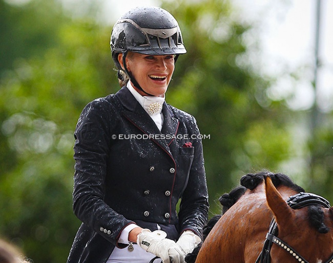 Yara Reichert in the rainy prize-giving ceremony at the 2021 World Young Horse Championships :: Photo © Astrid Appels