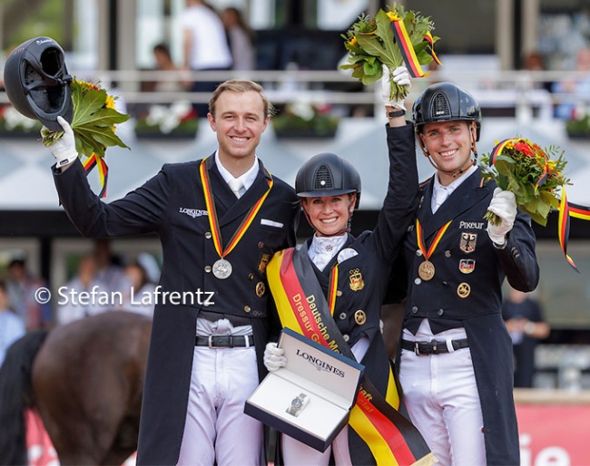 Sönke Rothenberger, Jessica von Bredow-Werndl, Frederic Wandres on the podium at the 2023 German Dressage Championships in Balve :: Photo © Stefan Lafrentz