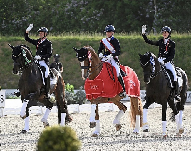 The senior medal winners: Andreas Helgstrand (bronze), Nanna Skodborg Merrald (gold), Carina Cassoe Kruth (silver) at the 2023 Danish Championships :: Photos © Ridehesten