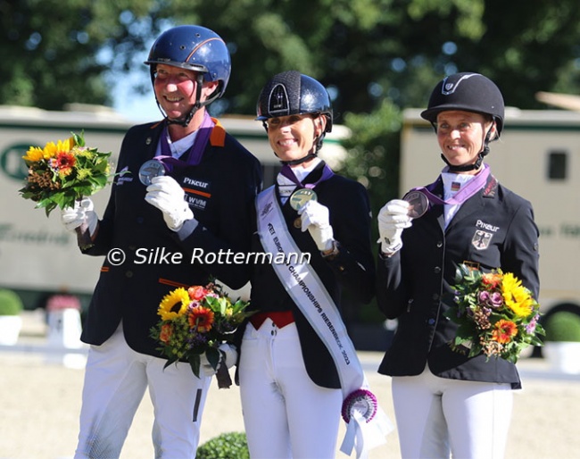 The Grade V individual podium: Frank Hosmar, Michele George and Regine Mispelkamp :: Photos © Silke Rottermnn