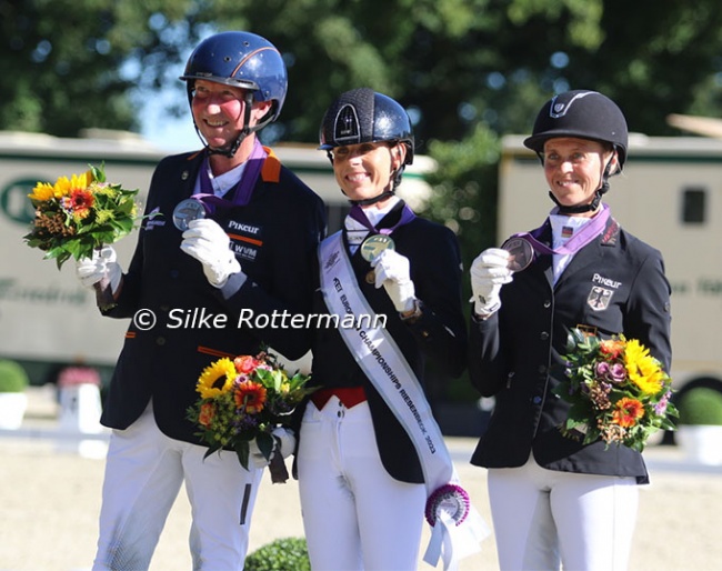 The Grade V individual podium: Frank Hosmar, Michele George and Regine Mispelkamp :: Photos © Silke Rottermnn