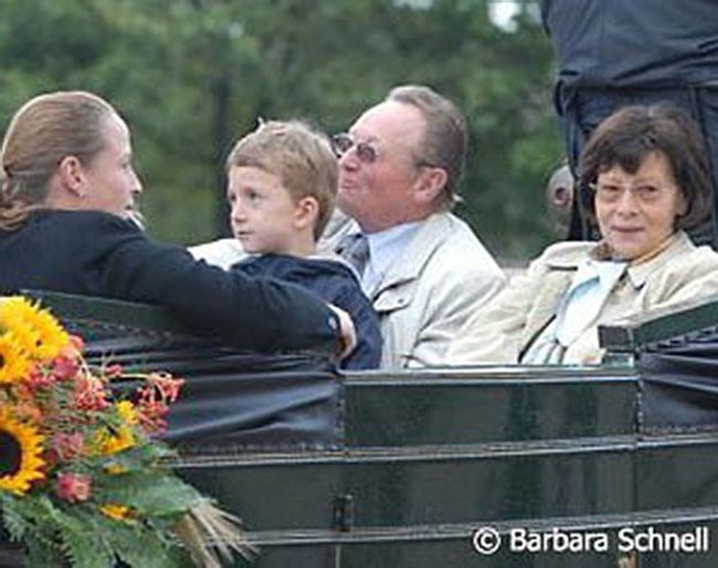 Heinrich Werth with wife Brigitte (right) and Isabell Werth (left) getting driven around her home town of Rheinberg in 2006 as part of the WEG medal winning celebration :: Photo © Barbara Schnell