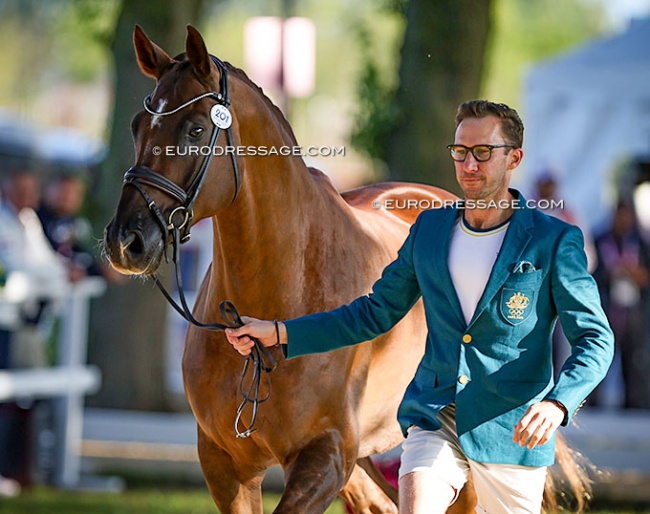Jayden Brown trotting up Quincy B at the 2024 Paris Olympic Games :: Photo © Astrid Appels