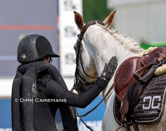 This safety vest did its job as this jumping rider fell off her horse :: Photo © Dirk Caremans
