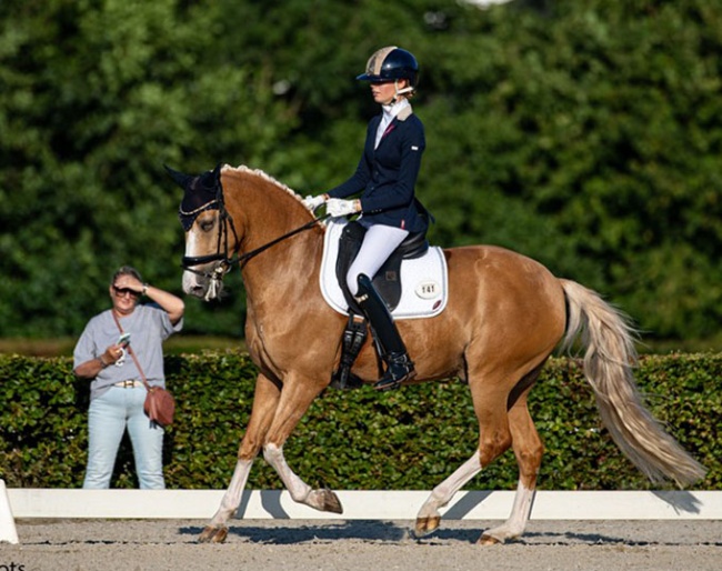 Trainr Nicole Werner watching student Isabella Karajkovic on First Hummer at the 2025 Hippiade