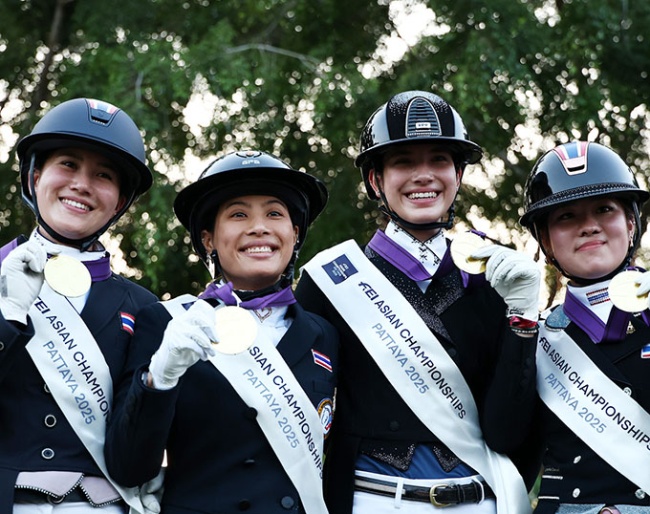 Pakjira Thongpakdi, HRH Princess Sirivannavari Nariratana Rajakanya Mahidol, Chanjanok Klara Ruecker and Nynn Puttisombat of Thailand celebrate after winning team gold during the Prix St-Georges dressage competition at the Thai Polo Club on November 25, 2025 in Pattaya, Thailand.