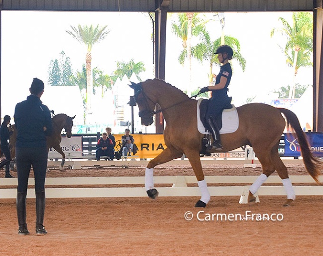 Olivia Lagoy-Weltz coaching a young rider in a clinic in Wellington :: Photo © Carmen Franco
