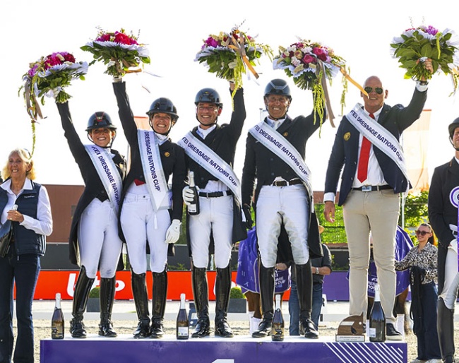 Defalque, Pauluis, Verboomen, Verwimp and chef d'equipe Jeroen van Lent on the podium for Belgium's FEI Nations Cup win at the 2026 CDIO Lier