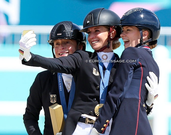 The three 2024 Olympic individual medal winners taking a selfie on the podium :: Photo © Astrid Appels